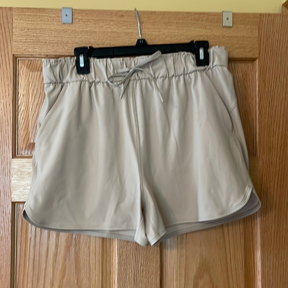 Lululemon Un-lined tan shorts size 10